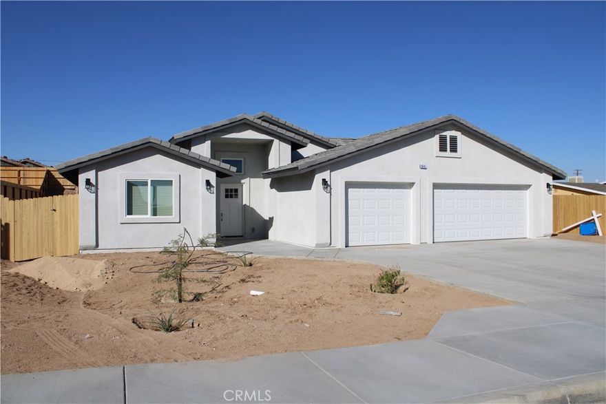 Brand New Construction  Welcome to this beautifully nearly finished, brand-new 4-bedroom, 3-bathroom home, offering 2,222 square feet of modern comfort and thoughtful design. This floor plan includes two primary suites, making it ideal for multi-generational living, guest accommodations, or simply extra space and flexibility. Located on a desirable neighborhood with other recently sold new builds by the same trusted builder, this home is crafted with quality features and attention to detail. Inside, you’ll find soaring ceilings, recessed lighting, and large windows that fill the home with natural light, creating a bright and airy atmosphere. The spacious kitchen is a true highlight, complete with quartz countertops, custom cabinetry, an oversized island with extra storage, an undermount sink, and a generously sized pantry—perfect for entertaining or everyday living. Each bedroom includes mirrored closet doors and ceiling fans for added comfort, while the indoor laundry room offers plenty of cabinetry and convenience. Step outside to your covered patio—an inviting space for morning coffee or evening gatherings. Additional highlights include: 3-car garage with full-size concrete driveway , Fully fenced backyard with RV parking, Landscaped front yard, All-electric home with paid-off solar system for energy efficiency and cost savings, Wi-Fi capable garage doors and water heater. 

Please note: Photos shown are of similar homes built recently by the same builder. The new model may feature slight variations but will maintain the same quality and style. Don’t miss the opportunity to own this stunning new home. Schedule your private tour today!
