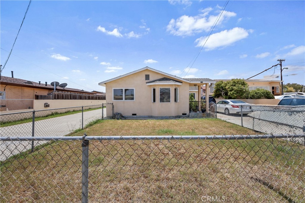 Development opportunity! Look at the Lot Size! It's 0.45 acre in the center of Carson.
After over 25 years, the seller has finally decided to let this property go. With almost half an acre of land in the center of Carson, this duplex have been well maintained and cared for by the owner. The front unit has 2 bedrooms and 2 bathrooms, tiled floor, upgraded kitchen, laundry hook-up and 2 detached garages. There is an automatic gate separating the back unit from the front unit. Behind the gate there is a quiet and peaceful sanctuary that has 2 big garages with carports. Plenty of space to entertain or build. The back unit has 2 bedrooms and 2 bathrooms with laundry hook-up, tiled floor, wooden patio deck, fruit trees and a front lanai perfect for entertaining.
Stop by and see all the possibilities for this property and let your imagination go wild.