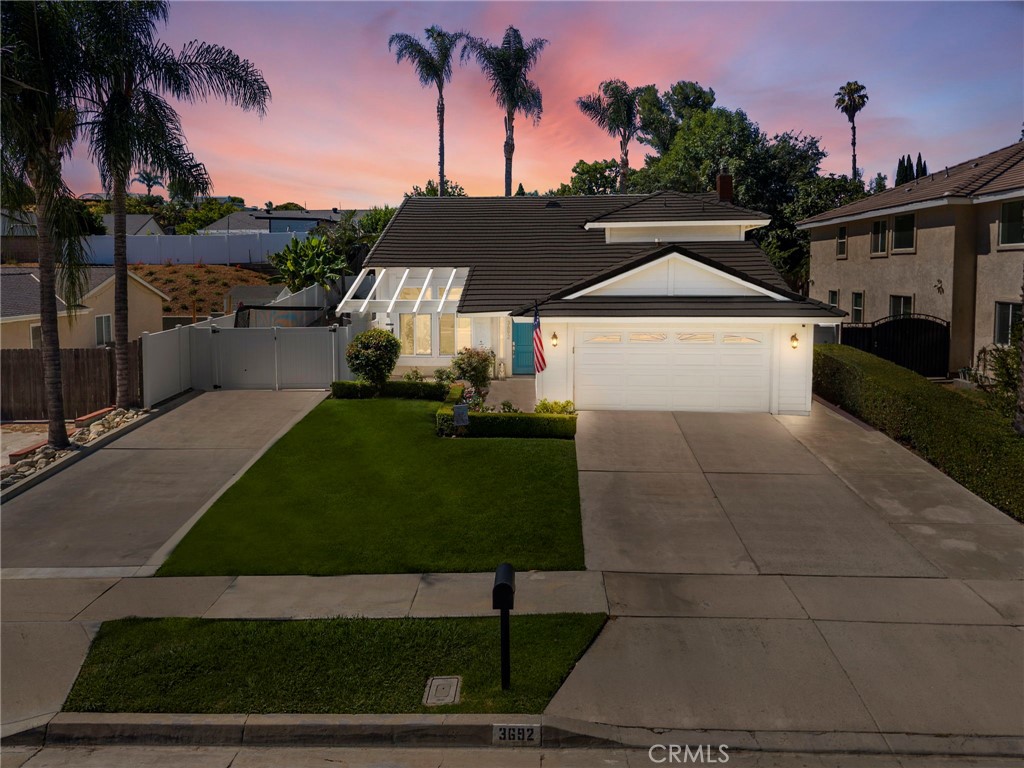 THIS HOME IS A MUST SEE! Beautiful home located in a quiet Chino Hills neighborhood. This home features a bright and open floor plan with 3 bedrooms, 3 bathrooms with 1,731 square feet of spacious living space. Upon entering, you are greeted by the spacious living room that features a cathedral ceiling, large front window that provides plenty of natural lighting and is adjacent to the formal dining room. The beautiful kitchen includes cabinetry for storage, stainless steel appliances, gas range with overhead hood, recessed lighting, and is open to the family room which makes it great for entertaining. The family room includes a cozy fireplace, built-in bar area with storage. Upstairs showcases a spacious Primary Suite that includes a spacious bedroom area with vaulted ceiling, walk-in closet and a beautiful ensuite bathroom that includes a large walk-in shower. Down the hall, there are two additional generously sized bedrooms which offer plenty of closet space, and a hall bathroom with a shower/tub combo. Beautiful, private backyard is beautifully designed with sparkling pool and spa, covered patio area, and RV parking area. Additional features of the property include 2 car garage, beautiful wood flooring throughout, inside laundry, whole house fan, and re-piped plumbing. Located across the street from a Nature Preserve that includes beautiful trees, walking trails, and playground. Centrally located in the heart of Chino Hills, close to schools, restaurants, and more. Come view this beautiful house and make it yours today!
