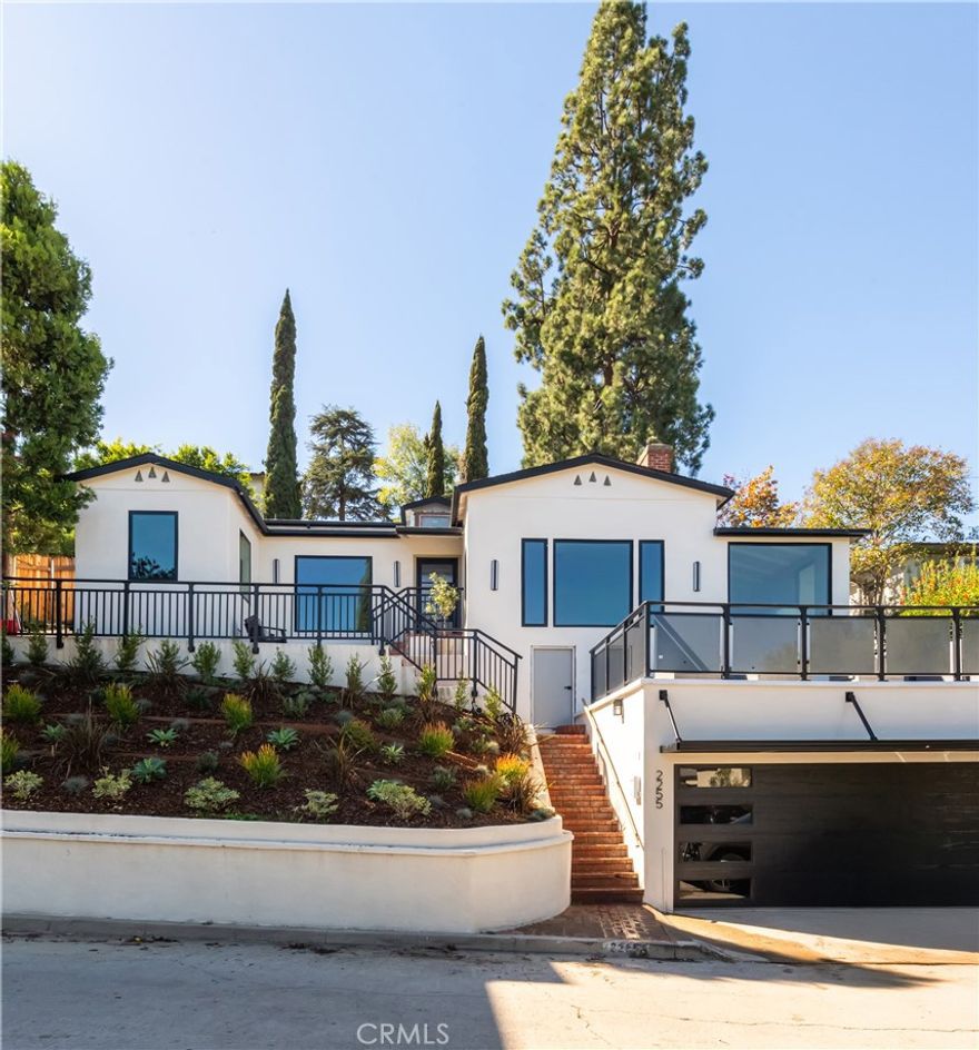 Stunning newly remodeled 2 bed, 2 bath contemporary home located in the highly coveted Franklin Hills area of  Los Feliz with breathtaking city and canyon views. Featuring bright and modern open floor plan includes a bonus room ideal for an office or a studio. The chef’s kitchen features high-end finishes, luxury Thermador appliances including range, refrigerator, and double oven, natural quartzite countertops, custom cabinetry, and designer lighting. Upgrades include new AC/HVAC system, new windows, and beautifully remodeled bathrooms. Enjoy seamless indoor-outdoor living with a spacious front view deck and a large private backyard, perfect for entertaining or relaxing. Situated on a 6,770 sq ft lot moments from Griffith Park, Los Feliz Village, and Silver Lake dining and shops.
