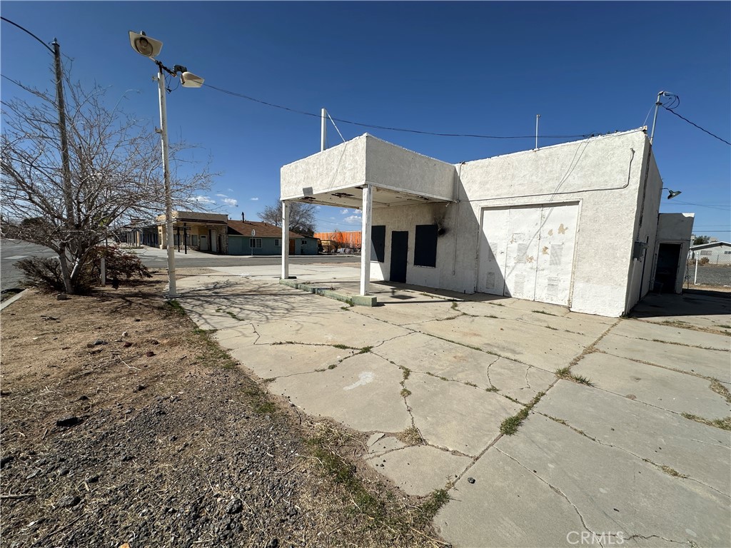 Here's a great opportunity to own a commercial building complex on almost an acre of land! 3 seperate buildings plus the entire back parking area has been covered with ground blacktop making a perfect parking area! Buildings will need some TLC. To be sold in as-is condition. Seller will not do any repairs. Bring us an offer!