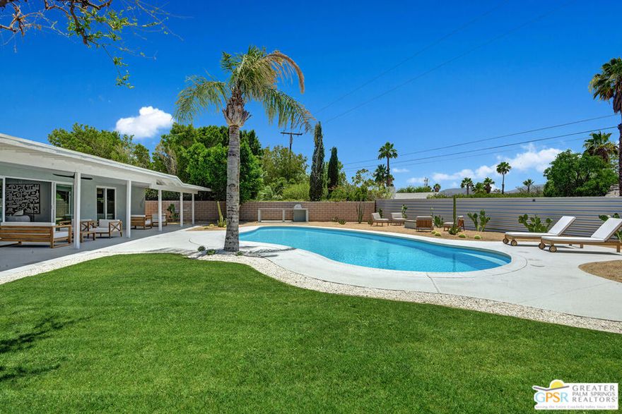 Located in the heart of El Rancho Vista Estates, the very first Wexler and Harrison residential development, this newly remodeled home is situated on the very street that Donald Wexler himself lived. Prepare to be captivated by the awe-inspiring southwestern vistas that stretch before you. Inside you are greeted by a fusion of contemporary design and classic charm. Every detail has been thoughtfully curated for a seamless flow throughout the home. From the open concept living spaces to the tastefully appointed bedrooms, this residence exudes the peace the California Desert is known for. The beautifully appointed kitchen and living area, as well as 3 of 4 bedrooms open onto a covered loggia that spans the whole back length of the home. Inside natural light abounds and outside the views are truly expansive and arresting. The backyard is thoughtfully landscaped & the massive aquamarine pool exudes the charm of classic Palm Springs. 14,375 sq ft of land means ample space to entertain guests, expand the current home, or add additional separate living quarters. Every moment spent in this backyard is a picturesque experience. Enjoy easy access to renowned dining, shopping, and entertainment options, as well as the vibrant culture that Palm Springs is known for.