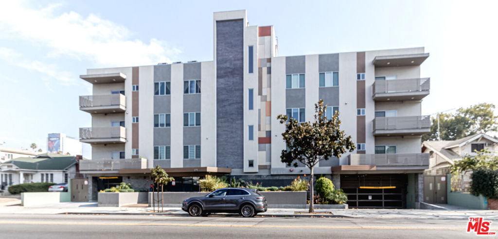 Elegant Top-Floor Condo in Prime Hancock Park Adjacent Location | Concord Estates II Welcome to Unit #405 at Concord Estates II, a rare opportunity to own a beautifully appointed top-floor condo in the heart of Los Angeles. Nestled on a charming tree-lined street just off Wilshire Blvd, this 3-bedroom, 2-bathroom unit offers the perfect blend of comfort, style, and convenience. Step into a bright and airy open-concept living space featuring high ceilings, large windows, and gleaming hardwood floors throughout. The spacious living room flows seamlessly into a private balcony ideal for morning coffee or evening relaxation. The updated kitchen boasts granite countertops, stainless steel appliances, and a breakfast bar that opens to the dining area, perfect for entertaining. The kitchen and bathroom cabinets, along with all doors and exterior building materials, are sourced and imported directly from Korea, ensuring high quality and craftsmanship. The generous primary suite features a walk-in closet and en-suite bath with dual sinks and a soaking tub. The second bedroom is perfect for guests, a home office, or a creative space. Additional highlights include in-unit laundry, central A/C and heating, gated parking with 3 assigned spaces (2-tandem & 1-adjacent), and secure building access. Also comes with one storage unit in garage. Take advantage of the expansive rooftop sun deck, ideal for outdoor entertaining and al fresco dining. Located in a well-maintained building with low HOA dues, Concord Estates II is moments from Koreatown, Larchmont Village, and Downtown LA, offering easy access to shopping, dining, and public transportation. Don't miss your chance to own a stylish home in one of LA's most desirable neighborhoods.
