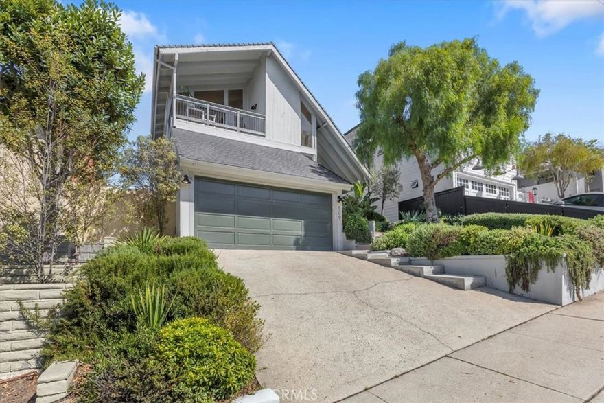 This coastal traditional home sits on one of the most desirable streets in the American Martyrs Tree Section area of Manhattan Beach. Located on a cul-de-sac, this home is a short walk to Live Oak park, the greenbelt, schools, the beach, the Farmer’s Market, the Manhattan Beach Pier and all of the downtown shops & restaurants. As you enter, you are greeted with a welcoming and bright great room with soaring high ceilings that flows into a family room with an open kitchen, breakfast nook and bar area. The gourmet kitchen has been remodeled and is in pristine condition. The family room opens to a spacious outdoor retreat with plenty of seating and a dining area complete with a fire pit. The first floor also has two bedrooms, a full bath, a powder room and an additional room with French doors and laundry. The upstairs has a spacious primary suite, a sun-filled open office area and deck. This is truly the perfect beach home with proximity to ALL that Manhattan Beach has to offer! Flexible terms, call for more details.