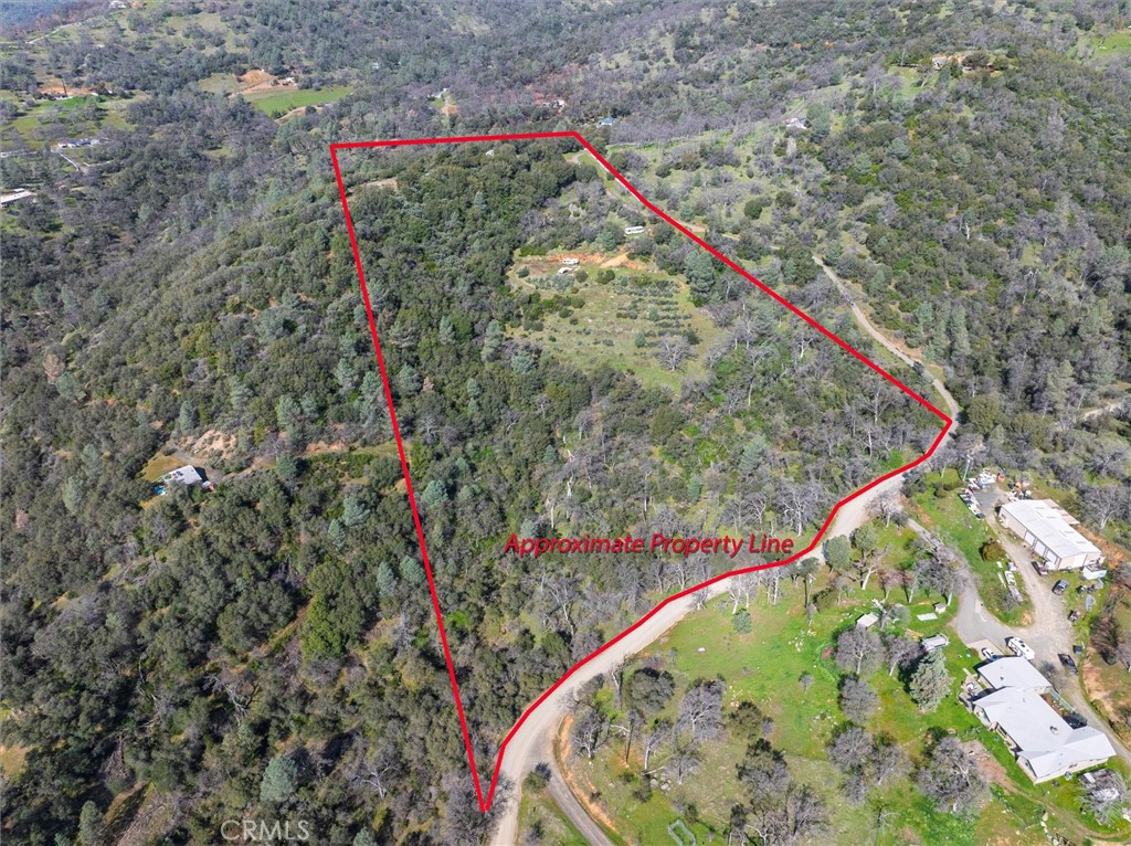 20+ Acre Rural Retreat - 2.5 miles from Town, 30 miles to Gateway to Yosemite
Discover your own slice of serenity with this expansive 20+ acre parcel. Enjoy the best of both worlds: peaceful country living just 5 minutes from town conveniences. Featuring two distinct building sites, offering picturesque views. Some essential infrastructure is already in place, including a well, pump, and water storage. Power is conveniently close. This prime location is approximately 30 miles from the breathtaking Yosemite National Park, making it ideal for nature enthusiasts and those seeking a tranquil escape. Call your favorite Realtor today
