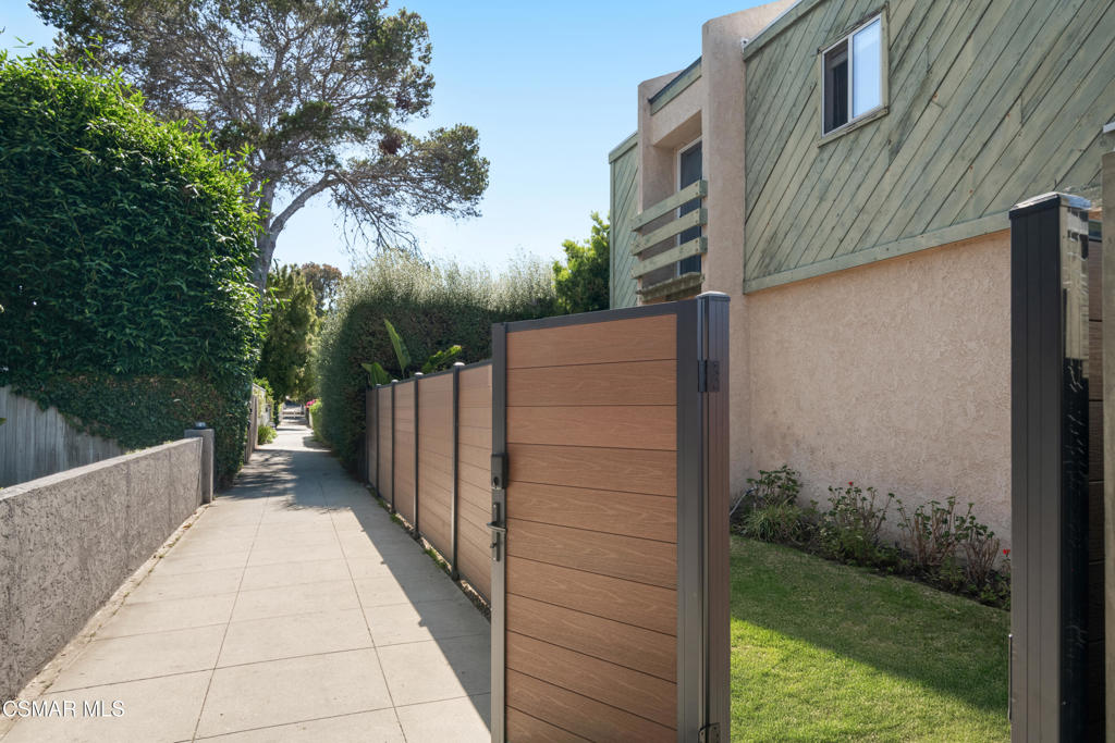 Fully remodeled, two-story end-unit townhome tucked away in a charming walk-street community just south of Lincoln Blvd in Santa Monica. Ideally located near Gelson's, dry cleaners, pet store, pharmacy, fine dining, and only minutes from the sand, this private and light-filled residence offers the best of coastal breezes and coastal living.Enjoy brand new kitchen countertops & cabinets, modern appliances, luxury vinyl wide plank flooring throughout, new sliding doors, and freshly remodeled bathrooms. The two private bedrooms boast a large walk-in closet and a spacious closet both with abundant natural light. The open-concept living area flows seamlessly onto a tranquil private patio--perfect for morning coffee, outdoor reading, or a dedicated pet space.As a cozy 4 unit building, this home offers added privacy and includes a small yard--ideal for outdoor play or lounging. Gated entry ensures a sense of comfort and convenience in this peaceful, well-kept complex. Gated-secured parking is being decided upon in near future.Community laundry room is located in the carport area however you are allowed to install your own inside your home if you so desire as well as your own A/C.