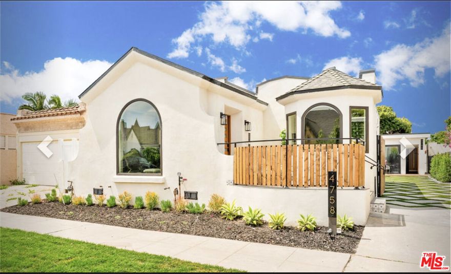 Experience timeless elegance and modern luxury in this meticulously remodeled Spanish-style home in sought-after West Adams. This house features 3 bedrooms and 2.5 bathrooms with designer touches, a Spanish-inspired facade with intricate detailing, an inviting porch, and contemporary colors. Expansive, light-filled living spaces are highlighted by arched doorways and gleaming engineered floors. The chef's kitchen boasts premium stainless steel appliances, custom cabinetry, and a spacious center island. The luxurious primary suite offers direct access to the back deck and a spa-like en-suite bathroom with dual shower heads. Enjoy a beautifully landscaped backyard retreat, perfect for outdoor entertaining and relaxation. Located in prime West Adams, known for its historic charm, vibrant culture, and convenient access to downtown LA, Culver City, popular restaurants, cafes, galleries, and transportation, including the Expo Line and Whole Food. There is an ADU in the backyard of the property that is currently rented to a tenant.