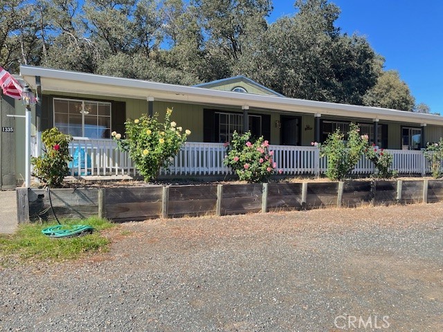 This property features a charming 3-bedroom, 2-bath manufactured home nestled on a spacious 2-acre lot, providing ample room for outdoor activities, gardening, or future expansions. The main home offers a comfortable and functional layout, with a large open-concept living space that combines the living room, dining area, and kitchen. The kitchen is equipped with modern appliances, granite counter tops, plenty of cabinetry, and a functional layout for easy meal prep. The master bedroom includes its own private ensuite bath, while the other two bedrooms share a second full bathroom.
On the same expansive property, there's a cozy 1-bedroom, 1-bath guest house. This separate dwelling is perfect for hosting guests, providing privacy, or even serving as a rental property. The guest house includes an open living area, a well-equipped kitchen, and a comfortable bedroom with an attached bathroom, making it fully self-contained.
The 2 acres of land provide room for a variety of uses, including outdoor entertaining, gardening, or even adding additional structures like a workshop or barn. Whether you’re looking for space for family and guests or seeking a peaceful retreat with room to grow, this property offers plenty of possibilities. Zoning is SR-DR-SC and C2-DR Split zoning. The possibilities are endless.