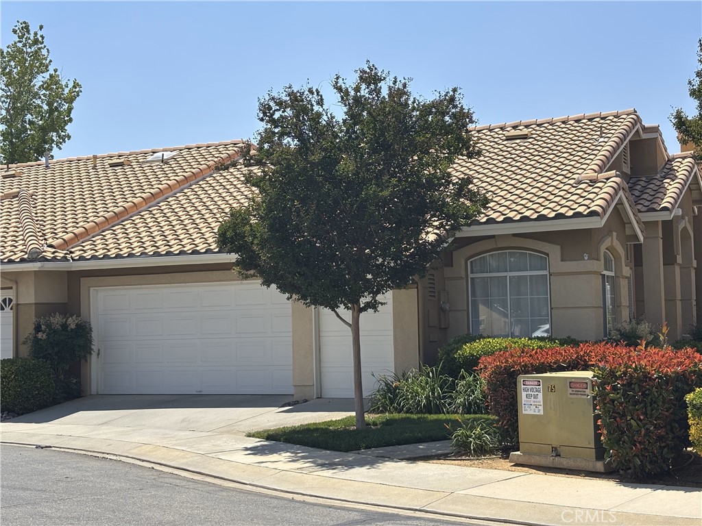 Welcome to the highly sought-after Cypress Point floor plan, featuring its own private golf cart garage with dedicated access. Ideally located near the community pool and spa, this well-maintained condo offers comfort, functionality, and the ease of low-maintenance living.
This charming home includes 2 bedrooms and 2 bathrooms, a spacious living room, a formal dining area, and a bright, open kitchen with a cozy breakfast nook surrounded by windows that invite natural light. The kitchen flows seamlessly into the living area, making it perfect for entertaining. The laundry area is conveniently located in the garage.
The primary suite features sliding doors that open to the private backyard patio, along with dual sinks in the en-suite bathroom for added convenience. The low-maintenance backyard offers a solid patio cover, creating a relaxing and private outdoor retreat.
Located in Sun Lakes, a premier 55+ resort-style community, residents enjoy an impressive array of amenities including a Championship Golf Course, Executive Course, three clubhouses, restaurant and lounge, indoor and outdoor pools, tennis courts, bocce ball, pickleball, paddle ball, and three fully equipped fitness centers.
With an abundance of clubs, social events, and opportunities to build lasting friendships, Sun Lakes offers an exceptional lifestyle. Conveniently situated near top shopping, dining, and entertainment options, including Morongo Casino and Desert Hills Premium Outlets, with Palm Springs just a short drive east on Highway 10—you’ll have everything you need close to home.
Come experience the best of Sun Lakes living!