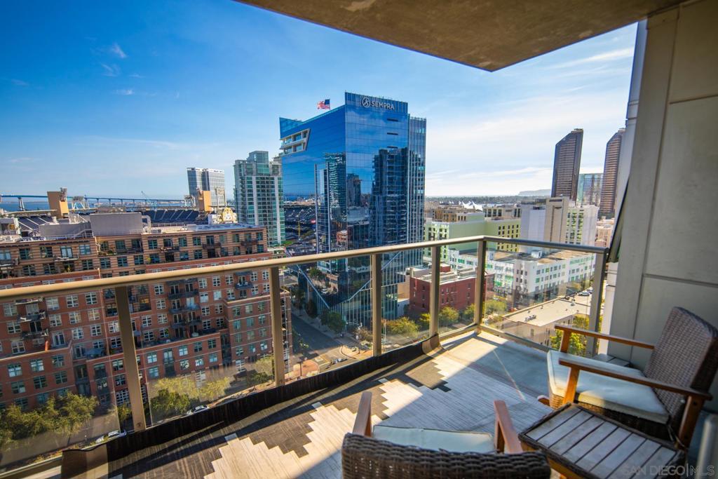 Experience luxury high-rise living in this spacious 16th-floor residence at The Mark, one of East Village’s sought-after communities. Perfectly located just steps from Petco Park yet positioned to avoid the noise and traffic, this home offers the ideal blend of excitement and serenity. The vibrant Gaslamp Quarter, scenic harbor, and charming Little Italy are all just minutes away, giving you endless options for dining, shopping, and entertainment. Inside, the open layout features a roomy living area with space for dining or a home office, plus access to a private balcony showcasing east, south, and westerly views—taking in the water, Coronado Bridge, Petco Park, and the sparkling city skyline. The kitchen is designed for both function and style, with stainless steel appliances, ample cabinet storage, generous counter space, and a convenient breakfast bar. The primary suite is a relaxing retreat where you can wake up to stunning views, step out onto your own private balcony, and unwind in a spacious bath with dual sinks. Additional highlights include an extra half bath, in-unit laundry, two side-by-side parking spaces, and a separate storage unit. The Mark offers unmatched amenities within its secure, gated community, including concierge service, 24-hour security, a newly updated saltwater pool and spa, BBQ and lounge areas, state-of-the-art fitness center, and conference room. VA approved, this residence combines modern comfort, breathtaking views, and resort-style living in the heart of Downtown San Diego.