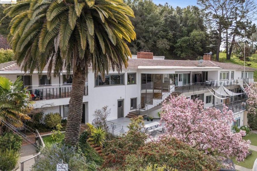 Amazing opportunity to continue on the legacy or redevelop this once in a lifetime property in the best location of Oakland with easy access to everything in the East Bay while having utmost privacy & sweeping bay views. 13+- acres are available for use with multiple tenants currently in place amongst the 4 buildings of 14,146sqft. This gated & secure property boasts an expansive old estate building from 1949 with 9,065sqft spread amongst 2.5 floors with sweeping bay views & endless indoor/outdoor flow to the beautiful gardens, playgrounds & level areas. A 3,293 sqft worship hall with a kitchen & 280 person assembly limit is perfect for churches & religious organizations of all sizes. In addition, this estate provides a 25’x60’ inground heated pool, sports courts, an additional 3 bed 2 bath home with 1,143 sqft & an original 2 bed/1 bath vacant cottage. Strong in place month to month tenants allow an organization to purchase with no down time as is & structure the future of this property with its endless options as a continued worship space, community center, private venue/retreat space, expansive family compound, or even a lot subdivision/re-development with custom homes. Visions are endless! Please do not visit property without an appointment. Views: Downtown,Ridge