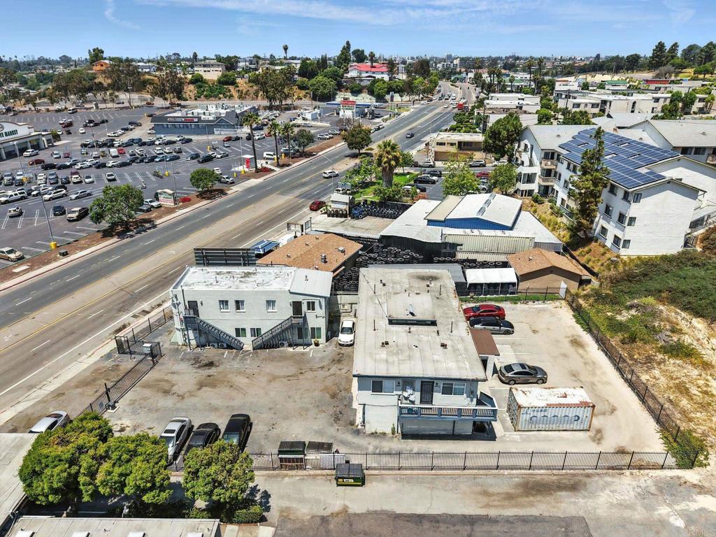 Aztec Canyon Apartments is a turnkey 10-unit multifamily asset located at 5502-06 University Avenue in the heart of San Diego’s Complete Communities zone. Situated on a generous 21,344 SF lot with 12+ parking spaces, this fully renovated 5,875 SF property features a strong unit mix—one 3BR, three 2BRs, and six 1BRs—all upgraded with new windows, sleek modern finishes, A/C, vinyl plank flooring, premium appliances, and updated kitchens and baths. Two units are designated affordable. The site offers multiple income streams and future upside. An on-site billboard generates passive income, with its lease expiring in January 2025—creating potential for renegotiation or redevelopment. Zoned for mixed-use with 6.5 FAR, no height limits, and parking incentives under Complete Communities, the property is well-positioned for density bonus and infill expansion. An assumable Chase loan at a 3.34% fixed rate through March 2027 adds financial appeal. Preliminary studies and conceptual plans for 20 additional 1BR units and new rear parking are available. Other perks include on-site laundry (2 washers / 2 dryers) and utility billbacks. Whether you're seeking stabilized income, development opportunity, or both—Aztec Canyon checks all the boxes.