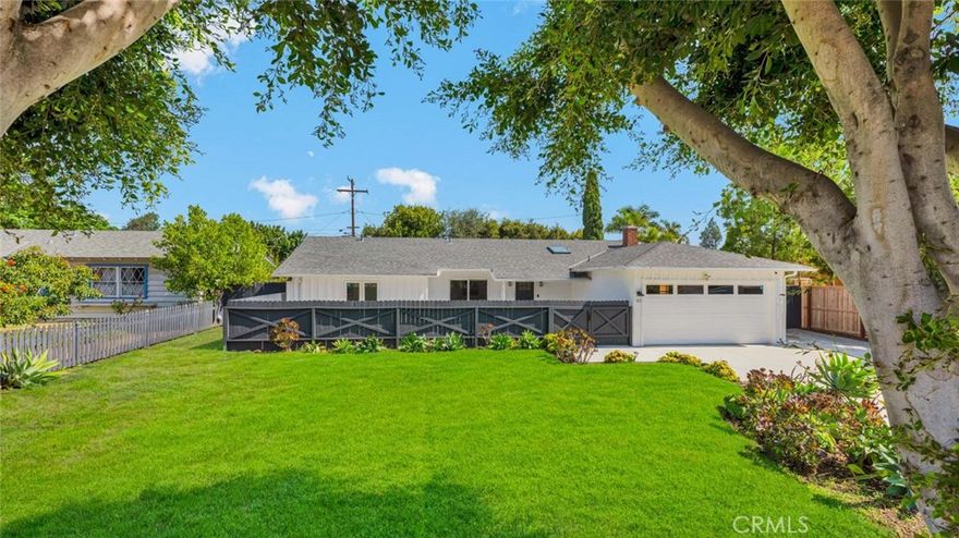 Welcome to 1311 La Colina Drive, an Immaculate Single Level Home Nestled on a Sought After Street in Tustin. This Desirable Open-Concept Floor Plan Showcases Four Bedrooms, Two Full Bathrooms, Vaulted Ceilings, and Natural Light Throughout. The Remodeled Kitchen Enjoys Ample Counter/Cabinet Space, an Oversized Island, High-End Stainless Steel Appliances, Wine Fridge, and Overlooks the Family Room. The Family Room and Dining Room Enjoy a Wood-Beamed Vaulted Ceiling, Skylight, and Backyard Access on Either Side, Perfect for Entertaining. The Primary Suite Enjoys Private Access to the Gated Front Patio, Ample Closet Space, and a Remodeled Walk-In Shower. The Expansive Backyard Showcases a Patio and Large Grass Area. Direct Access Two Car Garage with No HOA or Mello-Roos! Conveniently Located Nearby Tustin Shopping Centers, Old Town Tustin, Multiple Parks, and Award Winning Schools: Red Hill Elementary, Hewes Middle, and Foothill High. Easy Access to the 5/55/22 Freeways and 241/261 Toll Roads. 1311 La Colina Drive is a Must See!