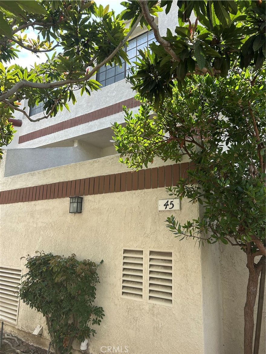 2-bedroom townhouse in a gated community, Springwood.  Hardwood floor throughout the unit except the stairs and kitchen and bathrooms have been updated.  Unit is located in the quiet side of the community with a plenty of guest parking.  Community offers swimming pool and spa.  Walking distance to Wilson Park and short drive to Del Amo shopping mall and beaches.