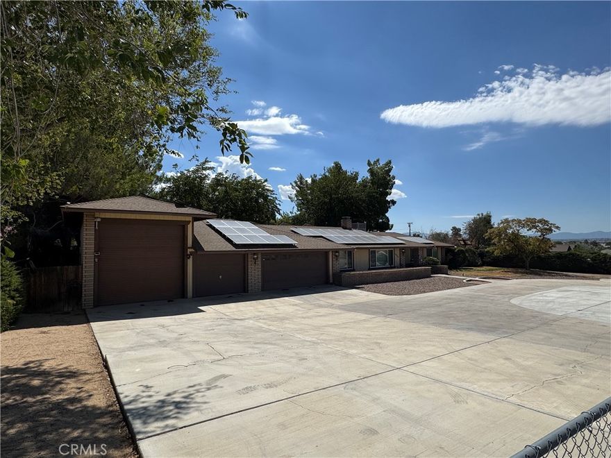 **Welcome to 4705 Mandan Rd., Apple Valley, CA – Your Dream Desert Oasis Awaits!**



Discover the perfect blend of sustainable living and luxurious comfort in this exceptional Apple Valley property. This meticulously maintained home offers an unparalleled lifestyle with features that set it apart from anything else on the market.



**Energy Independence & Sustainability:**

Enjoy the benefits of **fully paid-off solar panels** with **backup battery storage**, ensuring energy efficiency and peace of mind during any power outage. The property also features an **irrigation well**, providing cost-effective water solutions for your landscaping needs.



**Versatile Living Spaces:**

This home boasts **three spacious bedrooms** plus **two bonus rooms with HVAC ducting**, offering incredible flexibility as additional bedrooms, home offices, gym space, or creative studios. With elegant **tile flooring throughout**, maintenance is a breeze while maintaining a sophisticated aesthetic.



**Outdoor Enthusiast's Paradise:**

The property includes a **fully equipped greenhouse** – perfect for year-round gardening – and a **personal sauna** for ultimate relaxation. The expansive lot features multiple garage options: a **two-car garage, single garage, and RV garage with drive-through access to the backyard**, providing ample storage and convenience for all your vehicles and toys.



**Comfort & Luxury Features:**

- **Dual-sided fireplace** creating ambiance in multiple living areas

- **Garden tub in the master bedroom** for spa-like relaxation

- **AC and swamp cooler** systems for optimal climate control year-round



**The Perfect Setting:**

Located in the desirable Apple Valley area, this property offers the space, privacy, and amenities that High Desert living is known for, all while maintaining modern conveniences and energy efficiency.



This is more than a home – it's a lifestyle. Don't miss this rare opportunity to own a property that truly has it all!