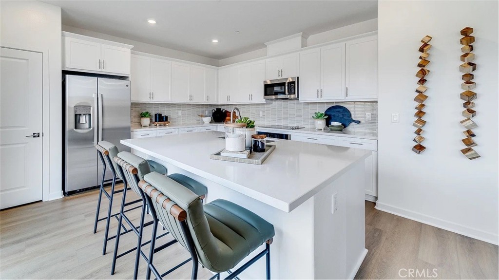 NEW CONSTRUCTION! This new two-story home features a bedroom and full bathroom off the entry, leading to a spacious and flexible open-concept layout shared between the kitchen, living and dining areas. Two additional bedrooms and a lavish owner’s suite are located on the second level, just steps from a convenient shared living area in the loft. The kitchen features Miami Vena White Quartz kitchen countertops and White cabinetry.
Glennview brings new single-family homes to the Springhill masterplan, now selling in Ontario, CA. Residents will enjoy access to available amenities within the masterplan, including a swimming pool, tot lot, park and more. Shopping and dining options are a short drive away at Ontario Mills Mall, along with nearby entertainment destinations like Top Golf. Plus, easily plan trips and travel with proximity to the Ontario Airport.