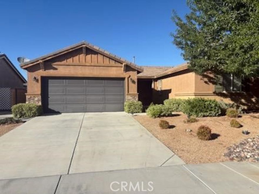 Great starter home with full kitchen, center island, that opens large living room. Spacious master bedroom with shower/tub combination + a wardrobe closet. There is a two-car garage with opener and rollup door. Large backyard with block wall fencing and room for pool or any other recreation area one wants to create. Put this on your list!