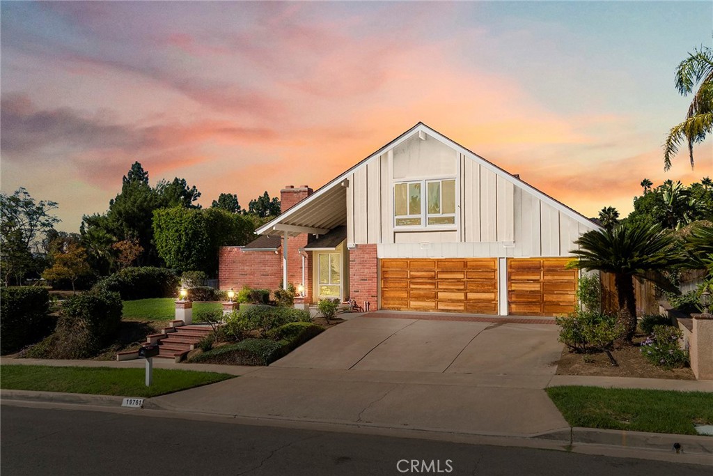 What a great location, close to excellent schools, and a short walk to Trader Joe’s! Situated on a corner lot of slightly more than a quarter of an acre with a six-bedroom home, this home is fantastic! The home has been freshly painted and all new flooring added both luxury vinyl and new carpeting. One of the most desirable features is the downstairs bedroom and bath. Suitable for guests or family members who might want a single-level home but don’t need that with this property. All the rooms are big and spacious, the front living room enjoys lots of light from the side yard and there is a slider to access that area of the property, a big fireplace to relax by and then the dining room that overlooks the living room adds to this exceptional space. The kitchen is open to the family room and looks out to the backyard with fruit trees and great patio space. Again, lots of light flowing into this area of the house. An inside laundry with a door to the side yard is perfect. Going up the stairs to the second floor that has five more bedrooms and a loft is incredible. Note the size of the bedrooms, two of the bedrooms are in the front (one of the options on this home was a big bonus room) and have beautiful mirrored closet doors as do all the bedrooms except the primary that has a walk-in closet. The loft could serve as an office or a study space. The hall bath is a full bath with double sinks. The primary bath has a walk-in shower. Impressive is the correct word for the size of these bedrooms. A wonderful design for a large family. Let’s step outside as the yard is spacious. A covered patio gives protection from the weather and provides usable space to relax. Fruit trees enhance the yard as does the large grass area, suitable for a future pool. So many advantages to this home, a short walk to Fairmont Elementary or to Bernardo Yorba Middle School. Located in central Yorba Linda gives you quick access to groceries, food, and shopping. Ready to move in and make it your own. Come and take a look, you will not be disappointed.