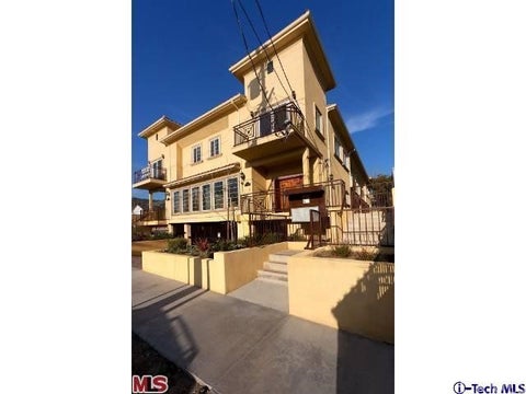 Photo of 10214 Fernglen Avenue #4, Tujunga, CA 91042 (MLS # GD26176348)