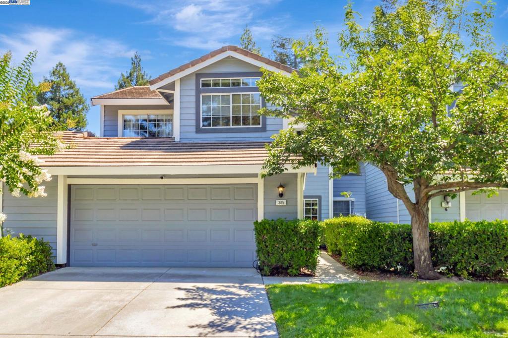 Welcome to this beautifully updated Portola Glen townhome offering an open-concept layout and a spacious, private backyard that backs to a peaceful greenbelt. The home features an updated kitchen, stylish laminate flooring, and newer carpet throughout the upstairs, creating a warm and modern atmosphere. Enjoy the expansive backyard with a large composite deck—perfect for relaxing or entertaining. The serene primary suite includes a private balcony nestled among the trees, offering a tranquil retreat. No rear neighbors Open floor plan with natural light, this home boasts a seamless flow ideal for everyday living and hosting guests. The convenient laundry area includes a full-size washer and gas dryer, with hookups for both gas and electric options. Additional highlights include an attached two-car garage with EV Charger already installed, Plenty of guest parking is available nearby for added convenience. Enjoy the Community pool, clubhouse and low HOA. Close to shopping , schools, parks and restaurants.