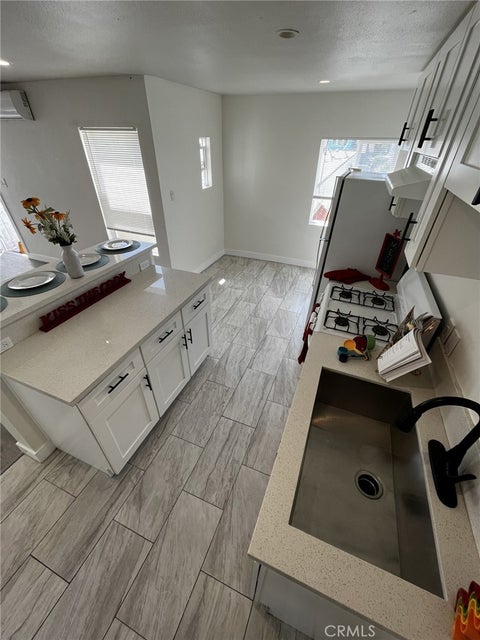 Photo of 4518 S Normandie Avenue #3/4, Los Angeles, CA 90037 (MLS # PW26071246)
