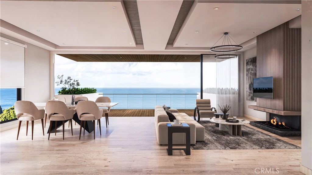 $1 Million Dollar Price Reduction for a Pre-Construction Purchase of this new Ocean view home! Construction is to start on July 15, and the price will gradually increase as the construction progresses. Forever unobstructed Ocean and Catalina Island views abound from this rare buildable lot large with 70 feet of frontage. Designed with an architectural vision to maximize views of the coastline and white-water waves from every room, this residence epitomizes coastal luxury. Designed for California's famous indoor/outdoor living with two stunning Ocean view decks, nothing was spared in the planning of this luxury enclave. This luxurious 3,542 SF, 4-bedroom, 4-bath ocean-view home is gracefully positioned on lower Alta Vista Way in internationally renowned Laguna Beach. Designed for California's famous indoor/outdoor living with two stunning ocean-view decks, nothing was spared in the planning of this luxury enclave. An ultra-luxury ocean-view home with an elevator, 2-car garage, and off-street parking for 4 additional vehicles. This site offers the ultimate in seclusion and direct street access, and it is bordered by a nature preserve on the ocean side of the property, ensuring views with no poles, wires, or rooftops. Two of the finest beaches in Southern California are within walking distance, as well as shops and restaurants. Take advantage of this incredible investment opportunity to build your dream home on one of the finest ocean-view sites in Laguna Beach.