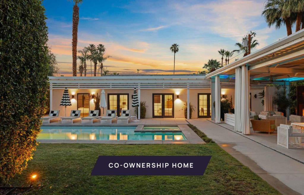 New co-ownership opportunity: Own one-eighth of this turnkey home, professionally managed by Pacaso. Bacana is a 5-bedroom, 5-bathroom compound perfectly situated at the end of a little cul-de-sac in sunny South Palm Springs. Overlooking the beautiful San Jacinto mountain range, this flexible vacation home is designed to be simple, fresh, and efficient. The compound has been completely reimagined to accommodate families, friends and large groups with fully furnished designer rooms, efficient kitchens, top-of-the-line appliances and original artwork. The five micro living spaces have three full kitchens, two mini bars and five spa-like bathrooms. The compound has been designed to provide each suite with a view of the new salt-water pool, spa, mountains and garden. Bacana has been thoughtfully and thoroughly designed to ensure a comfortable and efficient living experience. The spacious cabana includes a 10-person dining and seating area with a professional culinary demonstration kitchen, all with commanding views of the mountains and pool. Also included in the outdoor kitchen is a BBQ, two-burner cooktop, dishwasher and full sink. Completing the cabana is a large outdoor fireplace, two industrial fans, LED lighting and a recessed flat-screen television. The home comes fully furnished and professionally decorated.