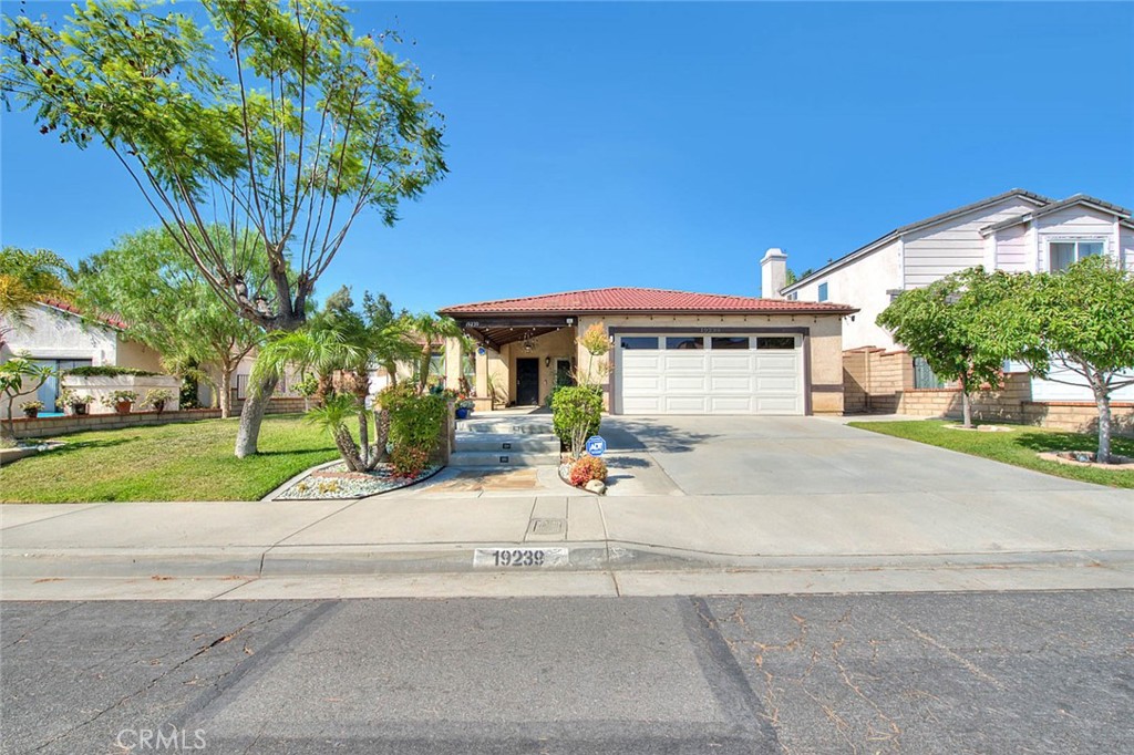 View ! View ! View! Upgraded single house with great backyard snow mountain view. Double panel windows and door, laminated wood flooring, Faux hand painted walls. Gorgeous custom mantel adorns the fireplace in the living room. Family room also has a wet bar with a sink. Gourmet kitchen with recessed ceiling, recessed lights, custom crown moldings, custom painting, tiled flooring, fine wood cabinetry, granite countertops, trimmed granite backsplash, stainless steel range oven, stainless hood & stainless dishwasher. Master bedroom has a fantastic 180 degree view. Master bathroom has a recessed ceiling, beautifully crafted crown moldings, custom sky painting, recessed lights; new vanity, linen and medicine cabinets, marble countertop, half height tiled walls and tiled flooring completes this masterfully finished master suite. The backyard has a large covered patio with an unobstructed panoramic view!! Front yard has a water fountain, beautiful landscaping, and built-in step lights. Convenient location to shops, parks, school and freeway.