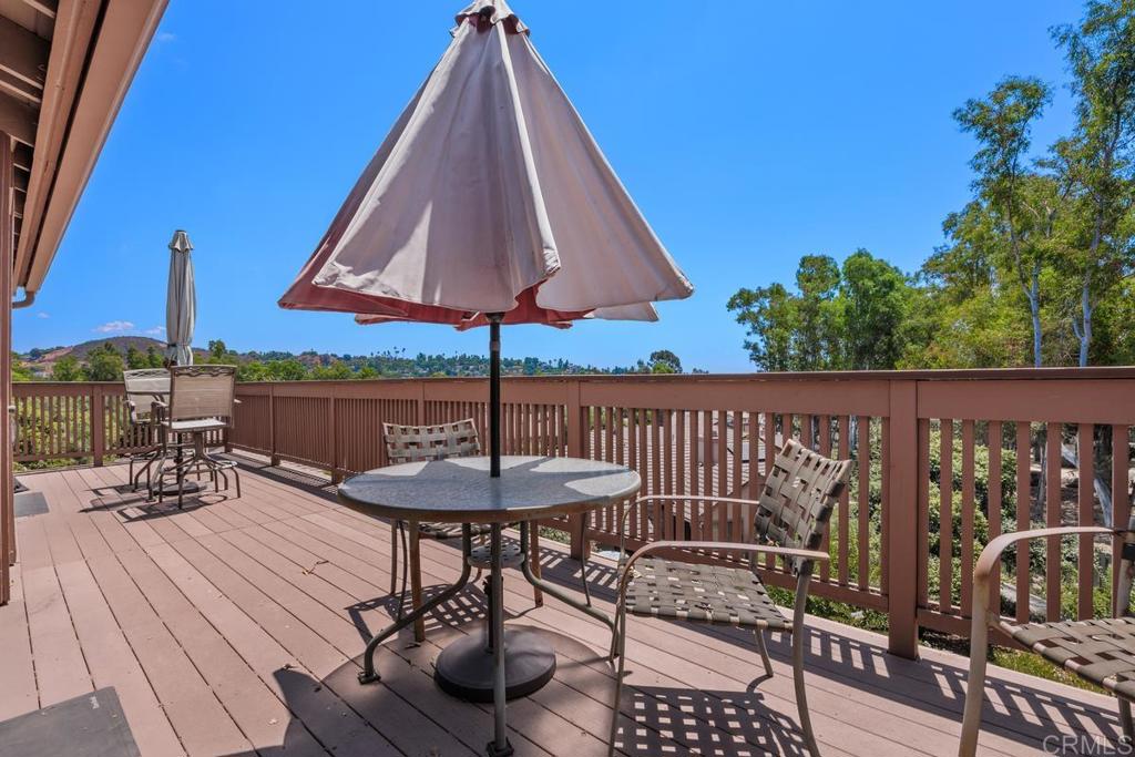 You've found what you're looking for! Welcome to this beautiful single level townhome (with only one shared wall) with beautiful panoramic views and situated in a quiet cul-de-sac of the quaint community of Morningside Woods. This well cared-for home features dual primary suites, spacious kitchen, large family room with soaring beamed ceilings, a welcoming front deck plus a wonderful back deck with forever views (perfect for your morning coffee or entertaining), separate 2-car garage, and near the community pool and spa. Morningside Woods is very close to freeways, tons of shopping and restaurants, and so much more. Welcome home!
