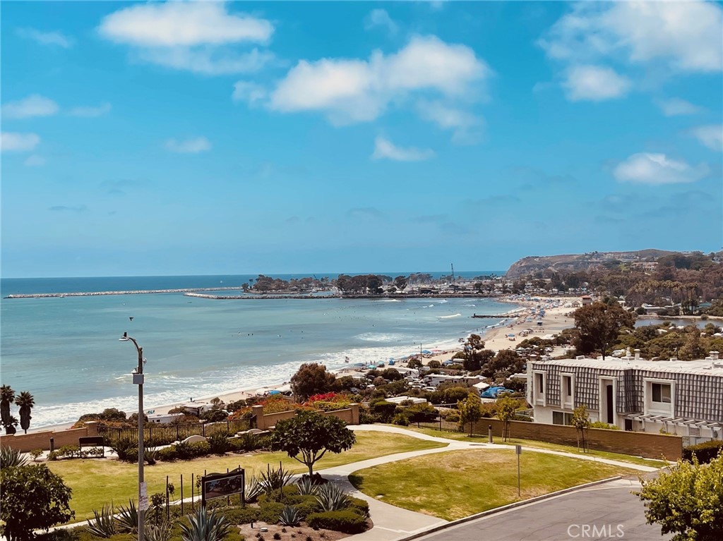 This Dramatic Dana Point upper duplex with 2 Bedrooms has just been remodeled! It's the one you've been waiting for! Enjoy ocean views from living, dining and breakfast room windows! Freshly painted and upgraded with crown moulding, new flooring, boasting open and bright living spaces is ready to enjoy. Featuring two balconies, one in front facing the ocean and one in back off the master bedroom. French doors open to the front balcony off the living room, offering fresh air and sunset ocean views. Spacious kitchen includes a breakfast room with ceiling fan, a cooks kitchen with a new stainless steel sink and faucet, 4 gas burner stove/oven, dishwasher, garbage disposal, with ample cabinetry and new counter tops. It's a great space to entertain! The upgraded new luxury plank vinyl flooring is throughout the home. It leads you to two oversized bedrooms offering great closets and storage space. The master bedroom has an adjoining balcony with a view of the backyard. The master bath has a newly tiled shower, new sink, faucets and mirrors. The second bath showcases a tub and shower combination and is located conveniently off the hallway. Enjoy a leisure ten minute walk to Capistrano Beach! Go for a swim or surf the waves! Minutes away is the Dana Point Harbor which is the home of countless boats, the Ocean Institute, Baby Beach, parks, fantastic shopping and ocean front restaurants. Easy access to the 5 freeway and the San Juan Capistrano train station makes this location very desirable if you commute. One garage space is included in the lease price and there is ample driveway and street parking. Great schools are close by. This home has the best beach vibe, casual lifestyle and impressive neighborhood!