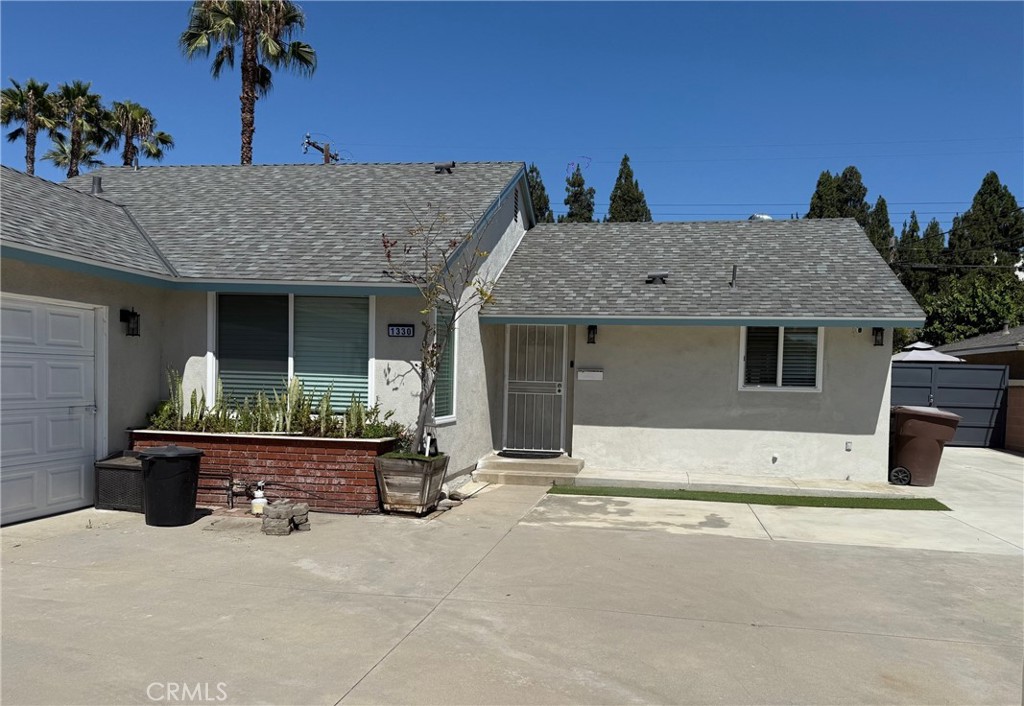 Beautiful one story single family home located on a quiet street. This property has 4 bedrooms, 2 baths, 2 car garage detached, and recently new central heat and air conditioning. The owner just recently remodeled a brand new kitchen, quartz countertop, quartz kitchen island, gas stove, and dishwasher. Both bathrooms were remodeled. Laminated through the house. Recessed light in the living room and kitchen. Dual pane windows, blinds for the windows. No pets, no smokers. Close to the market, restaurants, shopping, easy access to freeway, and next to the Disney land.