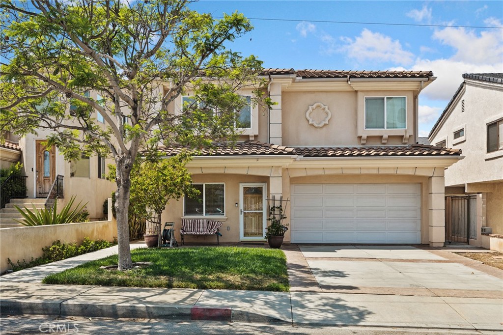 See the 360 tour here: https://bit.ly/3HrGtaA **Feels Like a Single-Family Home — in the Heart of Torrance**
Built in 2003, this thoughtfully-designed detached 4 bedroom, 2 & 1/2 bath condo at 2419 Border Ave #A, offers the grassy front yard and private rear patio of a single-family home.
The entry level sets the tone with a welcoming living room, a convenient guest bath, and a seamless open-concept kitchen, dining, and family room with a fireplace. From here, sliding glass doors lead directly to your west-facing backyard retreat, complete with a built-in outdoor kitchen featuring a grill, griddle, sink, refrigerator, with plenty of tiled counter space—ideal for year-round entertaining. Additional backyard highlights include beautifully tiled flooring, a retractable sunshade, and a tranquil fountain water feature.
Direct interior access to the 2-car garage on the ground floor offers a central vacuum and expanded storage, perfect for keeping your home clean, organized, and clutter-free.
The 4 bedrooms and 2 full bathrooms upstairs—including a spacious primary suite with double sinks and a separate spa tub—make it the perfect home for those who value both function and comfort. You'll appreciate the central heating and air conditioning and ceiling fans in each bedroom.
Location is another standout—just blocks from Torrance High School, Torrance Park & Kendall Field, and the Torrance Little League baseball diamonds, so recreation, community, and convenience are always close at hand.
You have found the home that delivers the **feel** of a single family residence with the pricing of a condo! This is your opportunity to have the best of both worlds.