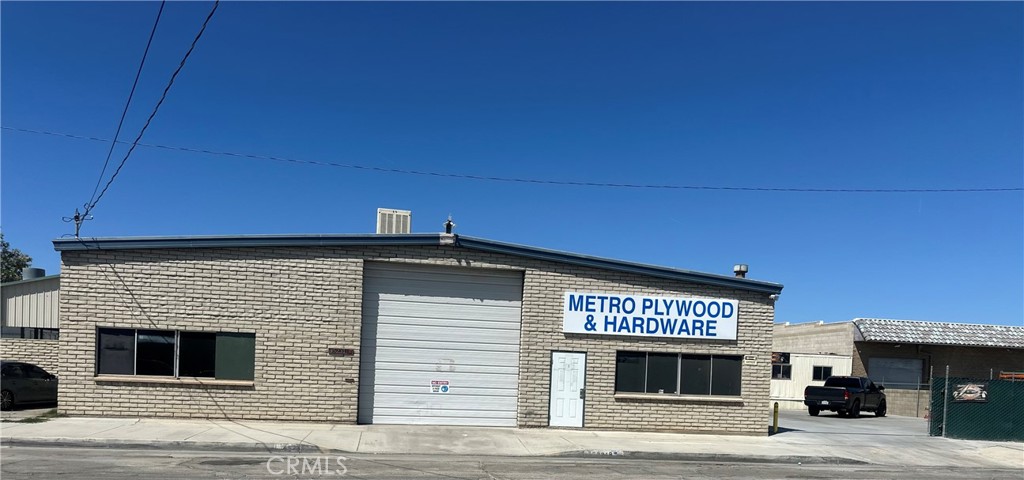 TWO FREESTANDING BUILDINGS; 45231 & 45223, 3 separate APN's being sold together only. 45231 Trevor is divided into two large warehouse spaces. Buildings Zoned LRHI Heavy industrial. One of the Buildings is currently set up as a Auto Body Repair shop, comes with 2 spray booths, an oversized air compressor and a car lift. Another Building is currently set up for a motorcycle shop and the 3rd one is currently used as a Hardwood store, with plenty parking, recently poured concrete, recently installed steel building and much more that you need to come and see it!