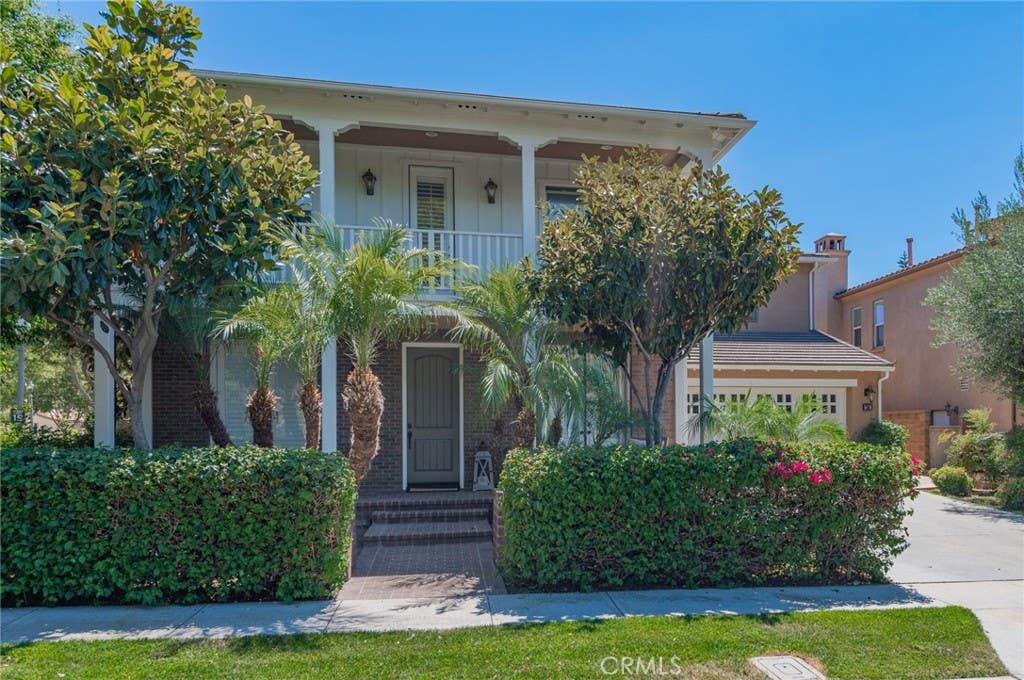 Photo of 36 Trailing Ivy, Irvine, CA 92620 (MLS # OC26159980)