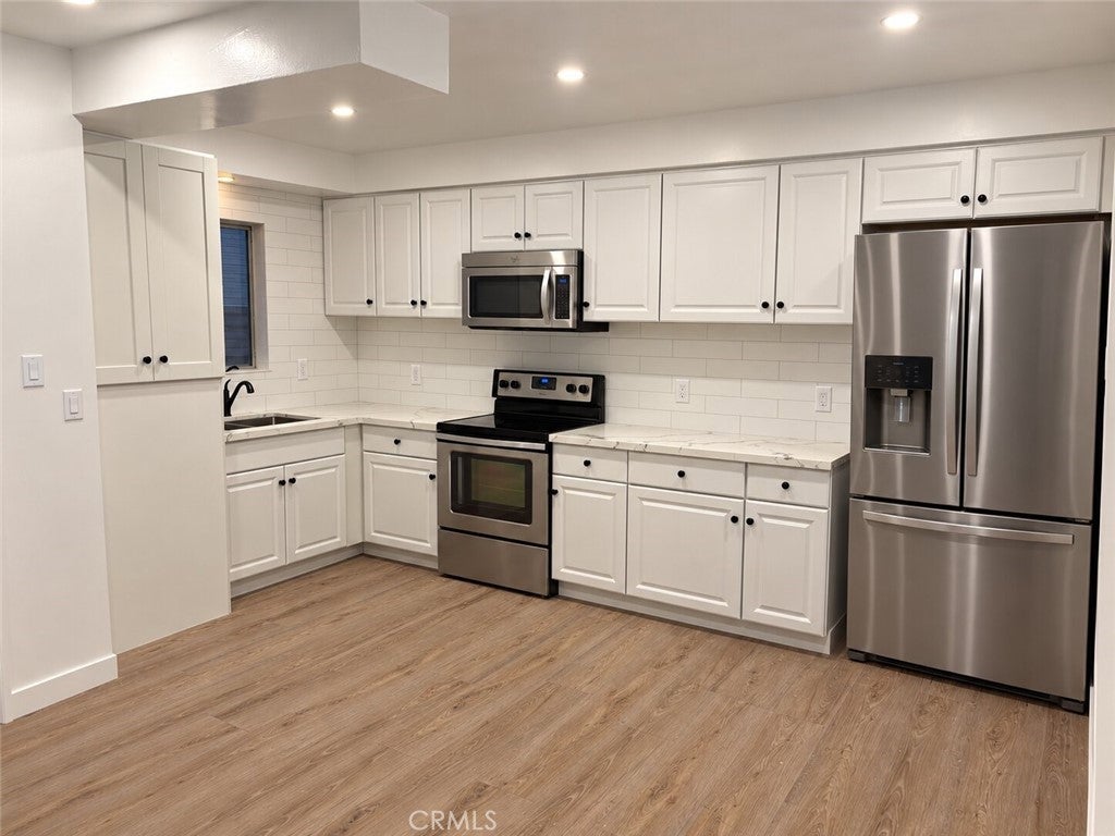 Photo of 810 Edgewood Street #202, Inglewood, CA 90302 (MLS # OC26230369)