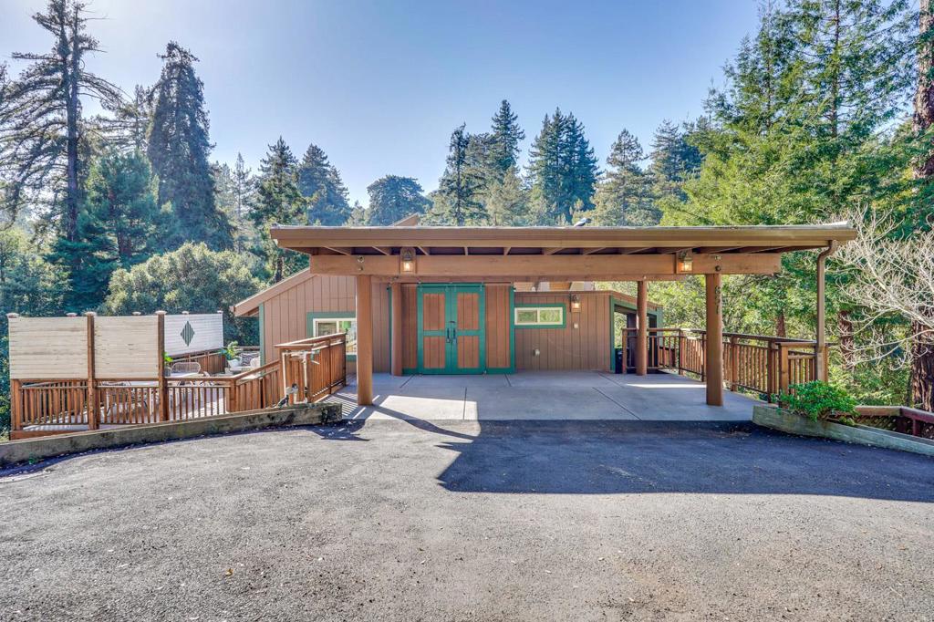 Escape to this serene Aptos Hills retreat, where nature and comfort blend seamlessly. Perched like a treehouse above the redwoods with views of Nisene Marks, the home is filled with natural light and peaceful energy. Enjoy central heating, a cozy wood-burning stove with fan, and updated appliances including a newer refrigerator, microwave, and dishwasher. A spacious deck is ideal for entertaining, while the sunny garden space offers endless potential. Recent upgrades include new carpet downstairs, waterproof vinyl flooring in the primary bedroom, recessed lighting, a ceiling fan, and a modern vanity in the primary bath. A detached 144 sq ft bonus office under the carport adds the perfect flex space for work or hobbies. Surrounded by hiking trails and just minutes from Monte Toyon Camp, youre only 3 minutes to Aptos Village shops and dininglike New Leaf Market and Penny Ice Creameryand 5 minutes to the beach. Whether youre gardening, hosting, or heading out for adventure, this home offers a rare balance of privacy, sunlight, and convenience.