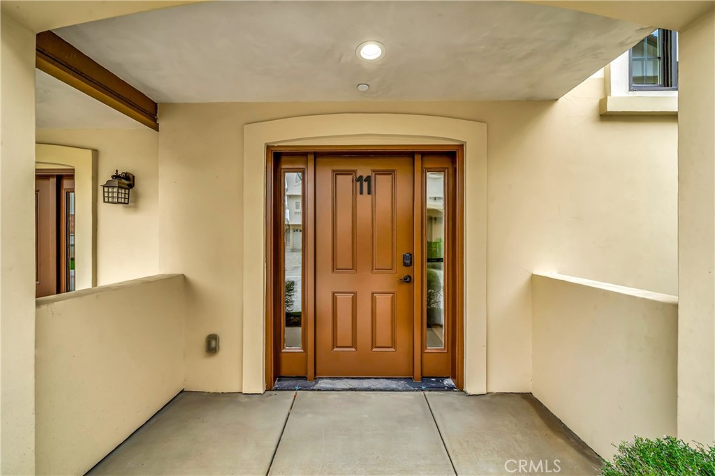 Welcome to 1101 N Maclay Avenue #11 – a beautifully designed 3-story townhome offering 1,730 square feet of modern living in the heart of San Fernando. Built in 2020, this home features contemporary finishes, spacious interiors, and scenic mountain views.
The first floor includes a convenient laundry area, a full bathroom, and brand-new Whirlpool appliances. Upstairs, a bright and open layout offers a flexible office space, an additional full bath, and a generous living room with a private balcony that overlooks the neighborhood and surrounding hills. The dining area flows seamlessly into a stylish kitchen outfitted with white cabinetry, quartz countertops, and stainless steel appliances.
On the third floor, you'll find two spacious bedrooms—each with its own full bathroom and ample closet space. The primary suite is the largest room in the home, offering a peaceful retreat with plenty of room to unwind.
This move-in ready home is located in a well-maintained gated community close to schools, parks, and downtown San Fernando.