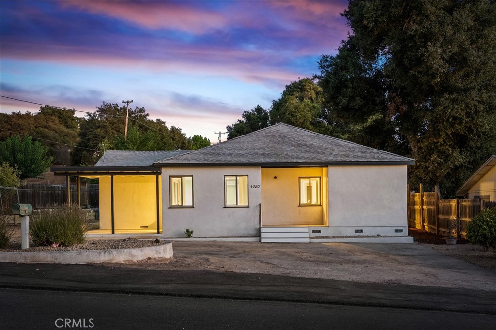 Introducing The Dolores Bungalow—a thoughtfully renovated single-level 3-bedroom, 2-bathroom home with 1,094± sq ft of living space on flat, usable land in a central Atascadero location.
Inside, natural light fills the open floor plan. The living room, with its ceiling fan and direct access to the side porch, flows easily into the dining area and kitchen. The kitchen is equipped with stainless steel appliances, quartz countertops, a range hood, ample storage, pantry, and backyard access.
The primary suite features a private bath with walk-in shower, tiled flooring, and single vanity. Two additional bedrooms include ceiling fans and laminate flooring. A separate laundry area with washer/dryer hookups adds convenience.
Outside, enjoy the relaxed Atascadero lifestyle with space to garden, entertain, or simply unwind. Covered porches at the side and back extend living outdoors, while a shed/carport and wood fencing add function and privacy.
Just minutes from downtown Atascadero—with great restaurants, coffee shops, an organic grocery, and a strong sense of community—The Dolores Bungalow offers modern comfort in a setting that embodies Atascadero living: casual, connected, and ready to enjoy.
