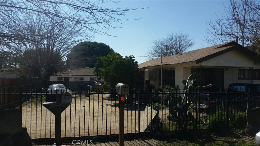 Opportunity abounds with these 3 units on a large lot triplex available to add to your portfolio.. Long term tenants currently residing on the property The choice is yours. You can choose between collecting from a money making triplex, or develop this parcel by utilizing its zoning to the best ability. # bedroom 1 bath house with its own yard and water meter, and a duplex in the rear with its own water meter. A 1 car garage is also on the property. Drive by only, Submit then show!