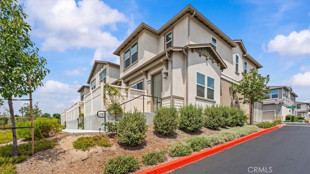 What an opportunity! This home is located in a gated community and has all of the amenities you would or could wish for! This home was built in 2023 is upgraded and ready for a new owner. This property is tucked away in an exclusive enclave and has had all of the upgrades you could ever dream of. Step inside and discover a bright and open floorplan, that has been thoughtfully designed to maximize the square footage of the home. Inside you will find designer selected finishes and Shaker style cabinets in the open and bright kitchen. The floor plan is an open concept, wherein the kitchen, dining area and living space are all connected. Additionally, you have 9 foot ceilings! The kitchen boasts quartz countertops and a stainless steel double sink, a polished chrome faucet, a Samsung stainless steel appliance package that includes a 30" 5 burner slide in range a built in microwave/hood combo and a dishwasher with integrated digital touch controls. The primary suite boasts walk-in closets. The primary bath includes slab countertops with a 4" backsplash. There is a shower and a soaking tub and so much more! This home offers energy efficient dual glazed low-E vinyl windows. There is a tankless water heater, R-15 exterior insulation in the attic areas for efficient temperature control. There are also water saving plumbing fixtures. This home has a tot lot, a recreational area and is very dog friendly. You are also commuter friendly to the 10 freeway without any negative freeway influences. Nearby you will find the delights of downtown Upland. There are restaurants, shopping and community events throughout the year. Don't hesitate to come and see this home. You will regret it if you miss out!!!