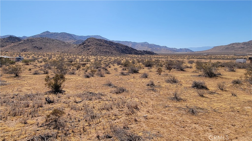 Quiet Country Living at Its Finest!
Discover wide-open space and breathtaking scenery in Northeast Apple Valley. This 5-acre parcel offers sweeping views of endless blue skies, the striking Sycamore Rocks, and the majestic San Gorgonio Mountains to the south. Nestled in a peaceful rural setting, it’s the perfect spot to build your dream home, enjoy off-grid living, or simply escape the city hustle while still being within a short drive of town amenities