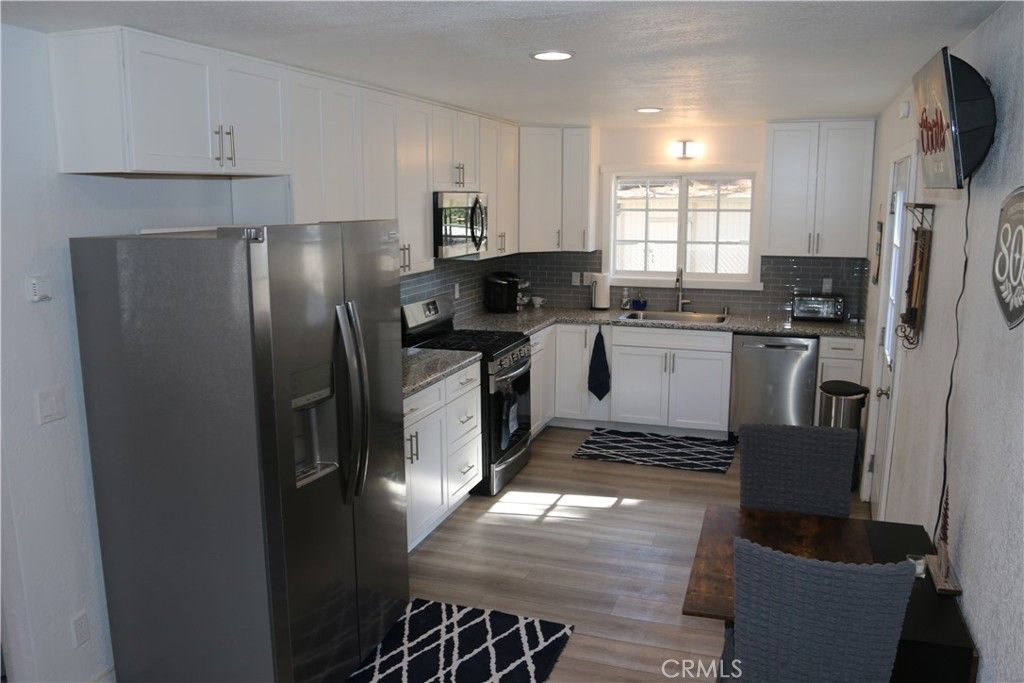 Photo of 509 Moreno Ave, Sugarloaf, CA 92386 (MLS # TR26095677)