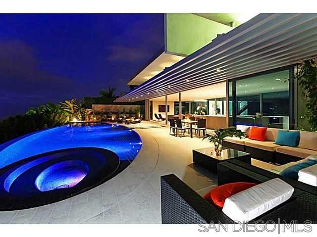 Fully furnished short-term rental available July or August. Extraordinary modern masterpiece with panoramic La Jolla Shores ocean views. Celebrity dream getaway. Meticulously built in 2008 with the latest in technology, amenities and ample use of space. Features include an exquisite inner courtyard which remains open to the elements and a vanishing edge pool & spa with vibrant 16 color lighting, built in barbecue and fire pit; all framed by a dramatic use of glass, steel and stone.
