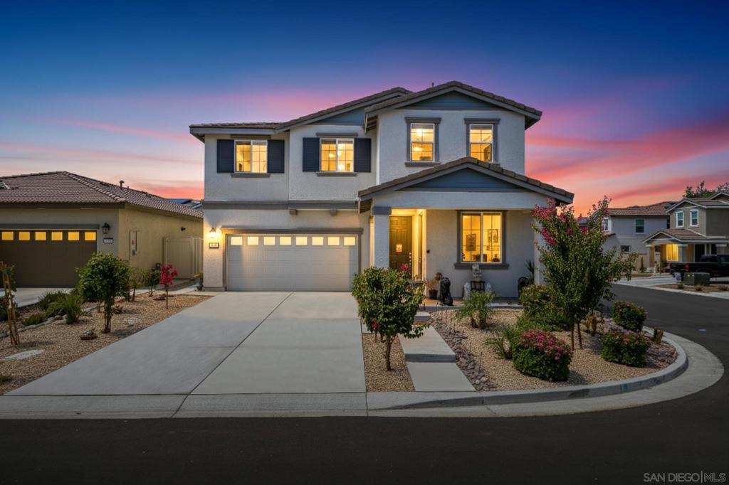 Step into the lifestyle you’ve been waiting for! This newer build Mountain Bridge North home comes with 14 fully paid off solar panels for maximum energy savings and a beautifully finished backyard complete with a brand-new concrete patio, stylish cover, and lush landscaping—perfect for weekends with family and friends. The highlight? A private first-floor suite with its own entrance, bathroom, and kitchenette—ideal for multigenerational living, hosting guests, or creating extra income through rental opportunities. Inside, the open-concept main level offers a bright living room, modern kitchen with a center island, and a welcoming dining space. Upstairs, enjoy the flexibility of a spacious loft, convenient laundry room, three secondary bedrooms, and a primary retreat with a spa-inspired bathroom designed for relaxation featuring dual vanities, a soaking tub, a walk-in shower and a generous walk-in closet. This home is a perfect match for buyers ready to make their first purchase, upsize with style, or invest in a smart income-generating opportunity.