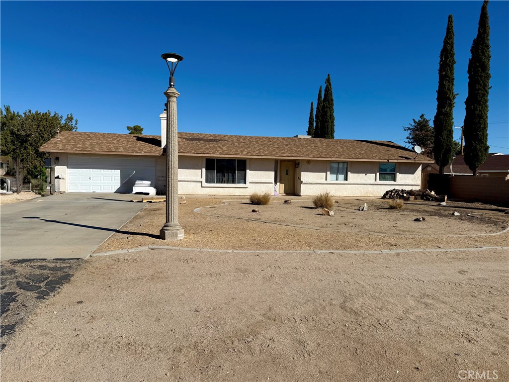 Beautiful Hesperia Home recent upgrades 3 bedroom 2 baths, kitchen with a lot of newer cabinets, coriander counter tops, stainless steel appliances microwave, stove, dishwasher, inside laundry room newer washer and dryer included tile floors newer inside paint, nice living room with a fireplace,
French door from dining area to outside cover patio a lot of concrete, central air and heat plus a widow evaporative cooler, rock landscaped, nice shed
for storage fenced back yard
