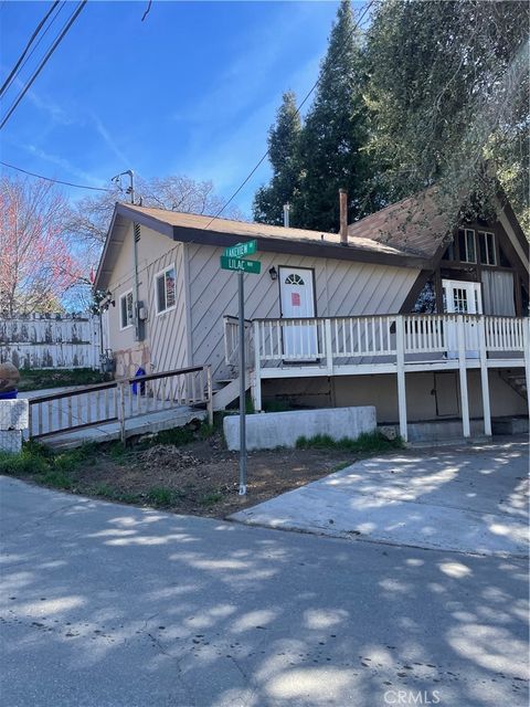 Photo of 29392 Lake View Dr, Cedar Glen, CA 92321 (MLS # IG26059220)