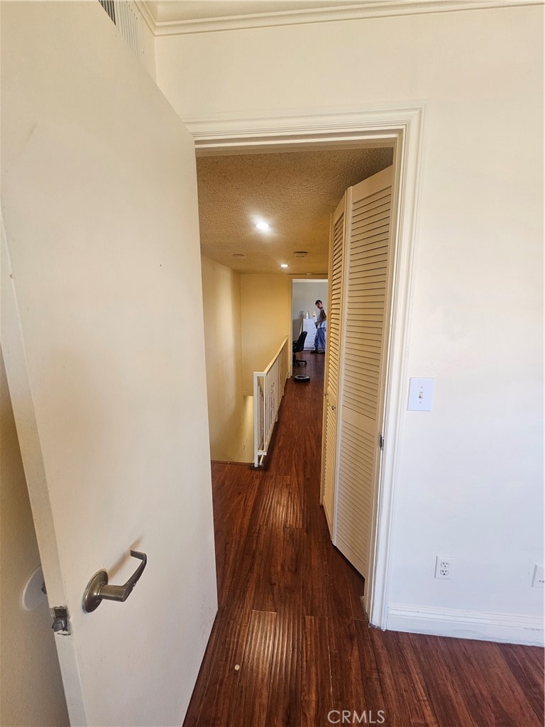 This property is a townhouse-style corner condo (Unit 15) in the Koreatown area of Los Angeles, built in 1974. It spans about 1,286 sq ft and offers 2 bedrooms and 3 bathrooms, designed across multiple levels for comfortable, private living.