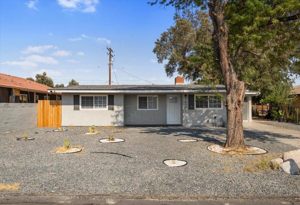 Beautifully remodeled home featuring 2 bedrooms, 2 bathrooms, plus a bonus room that can be used as extra storage, an office, or even a third bedroom. The kitchen boats white shaker cabinets, quartz countertops, and stainless-steel appliances. Enjoy the convenience of indoor laundry, with all appliances included - refrigerator, stove, microwave, washer, dryer - as well as a dining table and living room sofa. This is a move -in-ready home, perfect for long term living. (Fireplace in living room currently getting remodeled.)PLEASE NOTE: The home is currently occupied. Showings must be scheduled in advance. Current occupants will need 3 weeks to move out before the new tenant can take possession.