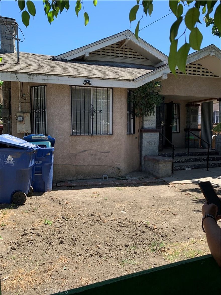 Good Single Family home for a large family. Home has 3 good sized bedrooms and two full bathrooms.  Kitchen boasts new white cabinets and nice counter tops. Wrought iron doors for extra security. Long driveway for several cars,  Home is clean and in move in condition.  Large back yard for entertaining and possible ADU.  Located near Schools and Transportation make it ideal for family.