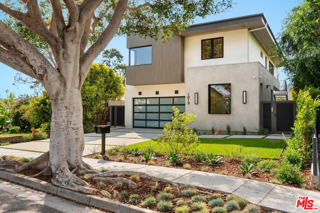 Tucked in the heart of Sunset Park, this newly built modern retreat features 5 spacious bedrooms, 5.5 baths, seamless indoor-outdoor flow, soaring ceilings, over 4,000 sq ft of inspired luxury, and an ocean-view rooftop deck that feels like your own private escape. The gourmet chef's kitchen with custom cabinetry, premium appliances and a massive island, seamlessly connects to expansive dining and living areas. Sliding glass doors create effortless flow to your spacious backyard, complete with built-in BBQ and serene privacy. Upstairs, each bedroom is its own tranquil retreat with en-suite baths, while the primary suite pampers you with a spa-like bathroom and private balcony. Up one more level, wind down on your rooftop deck with a built-in BBQ and ocean views stretching out before you. Minutes from top-rated schools, parks, trendy shops, and beaches, this rare home doesn't come around often in Sunset Park, but here it is.